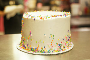vanilla iced sprinkle cake